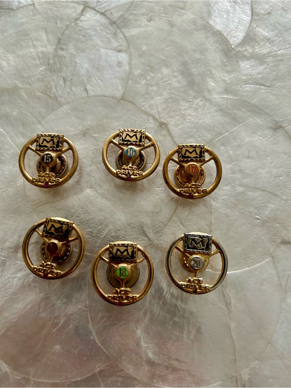 Vintage Gold-Tone Ace Driver Badge Pin Collection - Multi Color Accents
